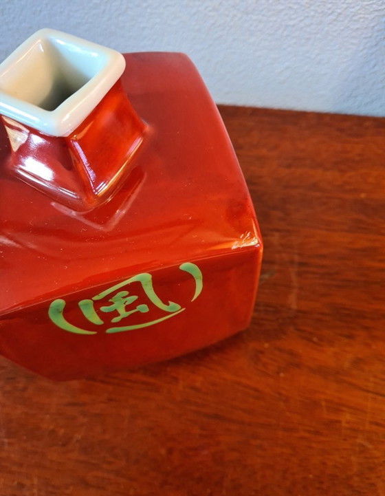 Image 1 of Old Arita porcelain vase in vermilion with the words "flowers, birds, wind and moon".