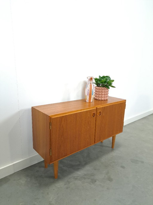 Teak cabinet with round handles