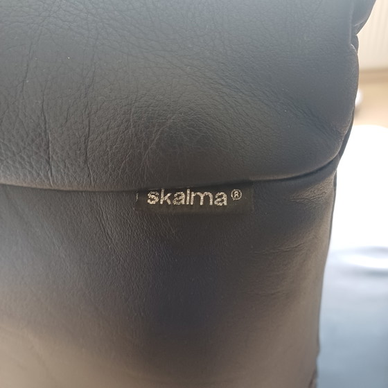 Image 1 of 1 fauteuil avec repose-pieds.