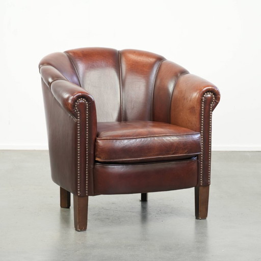 Characterful vintage sheepskin club armchair with an original design and beautiful warm colors – fauteuils, Leather
