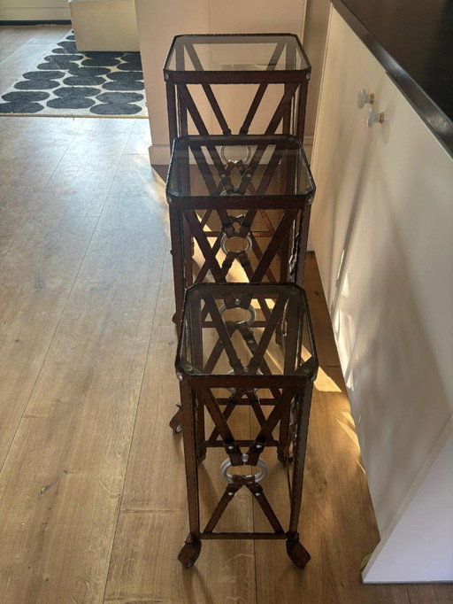 Unique set of 3 console tables – France, 1970s – in the style of Jacques Adnet – iron (imitation leather) and glass