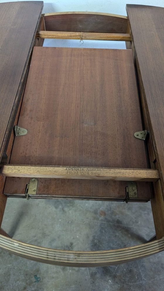 Image 1 of Vintage extendable dining table - round model in teak veneer- mid - Century