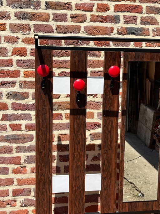 Vintage entryway cloakroom with bench and mirror