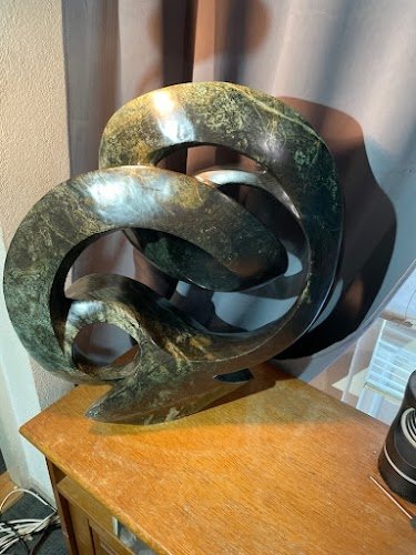 Image 1 of Handmade serpentine Shona sculpture by world-renowned artist Cliff Makore
