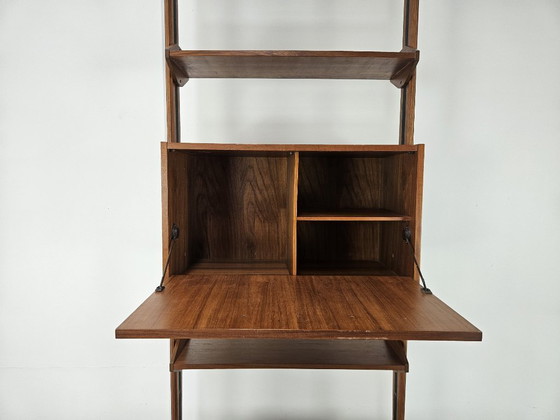 Image 1 of 1960s teak floor/sky bookcase with shelves and compartment