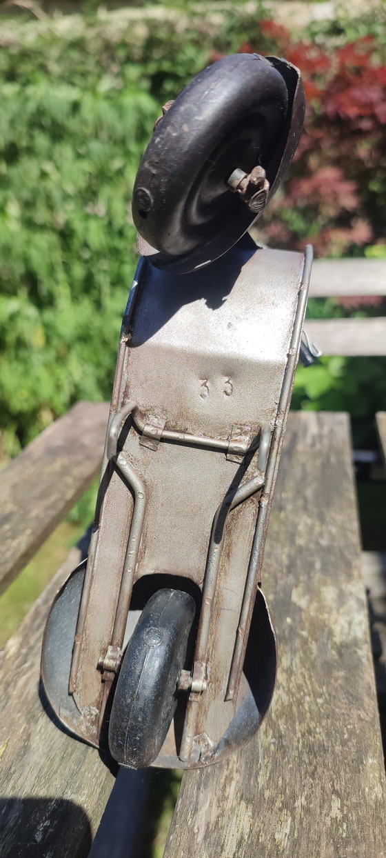 Image 1 of Vespa-style industrial scooter, numbered