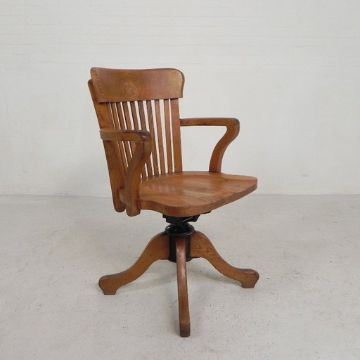 Silla de oficina de roble con sistema de muelles ajustable y regulación de altura, década de 1950. – draaistoelen, Wood, Iron