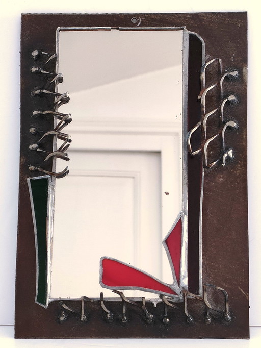 Brutalist mirror set glass and metal
