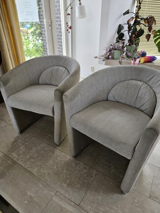 2 Leolux armchairs.
