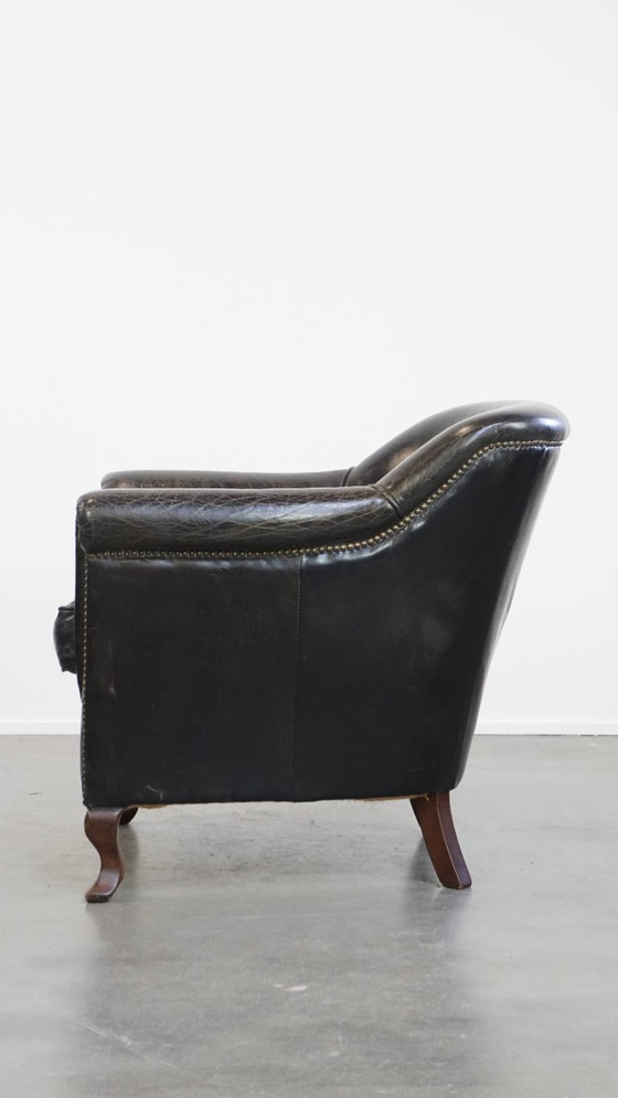 Image 1 of Zwarte generfde rundleren armchair/ fauteuil 