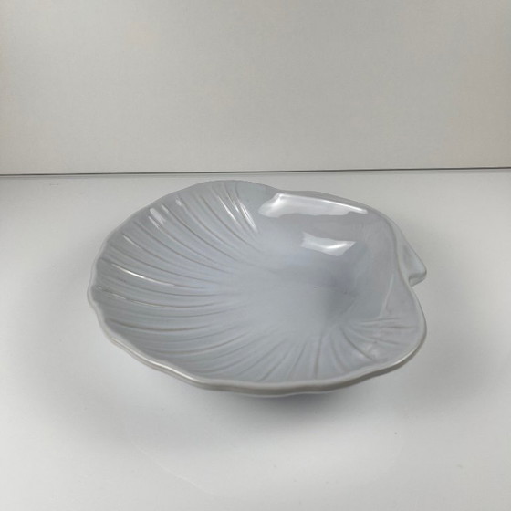 Image 1 of Large platter in the shape of a scallop shell, Emile Henry, France, mid-20th century