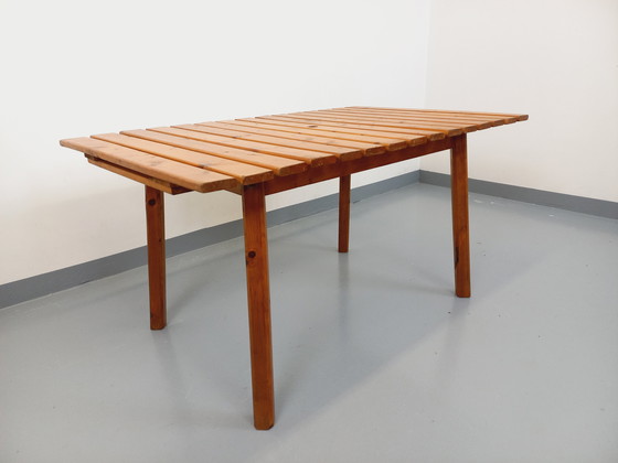 Image 1 of Vintage garden furniture consisting of a table with extensions and 4 wooden armchairs from the 60s