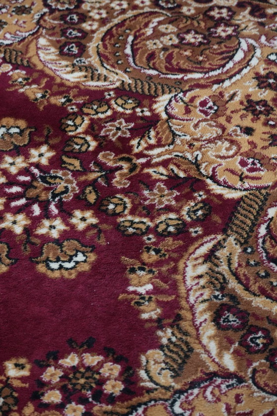 Image 1 of Grande tappeto con bellissimi motivi prevalentemente nei toni del rosso e del giallo 295x200cm