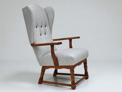 1950s, Danish high-backed armchair, reupholstered, wool, oak wood.