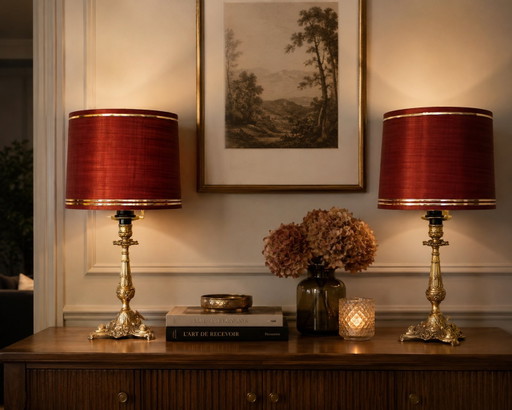 Pair of Italian gilt bronze dolphin lamps, Baroque style, restored Empire style