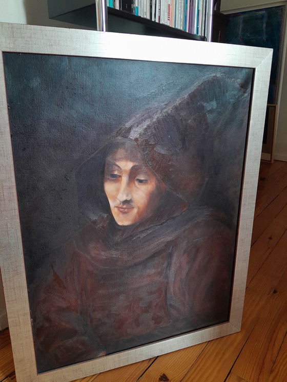 Image 1 of Retrato al óleo de un monje con un vestido rústico sobre un fondo marrón