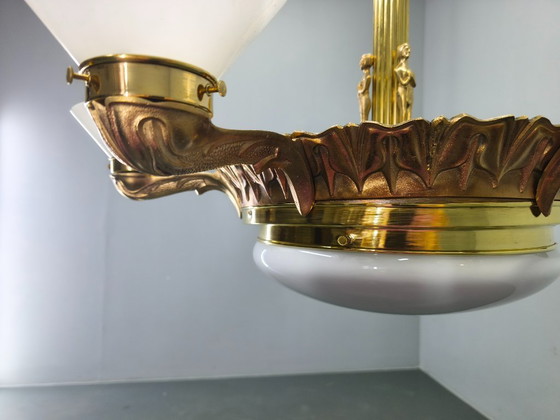 Image 1 of Lámpara de araña Art Déco de latón con pantallas de cristal, Checoslovaquia, década de 1930.