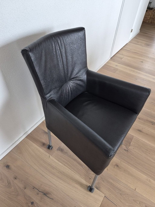 4 schwarze Ledersessel