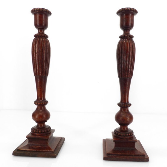 Image 1 of Pair of neoclassical carved and turned wood candlesticks, France, circa 1950