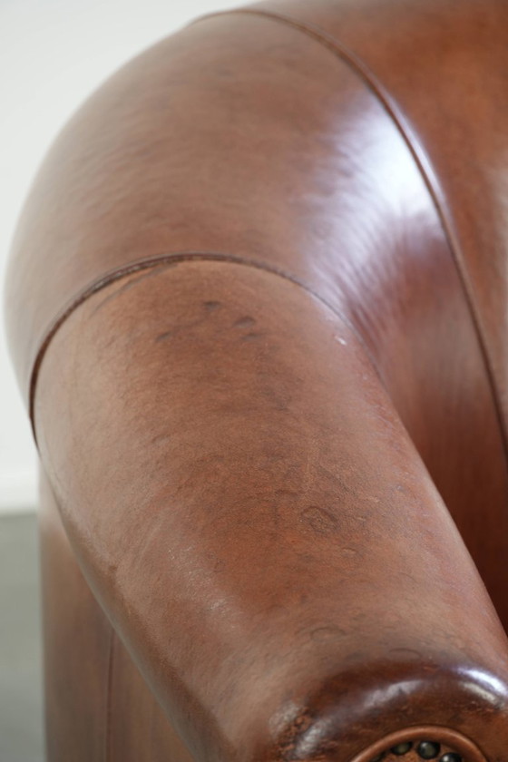 Image 1 of Mooie vintage schapenleren clubfauteuil in Engelse stijl met prachtige diepe kleuren