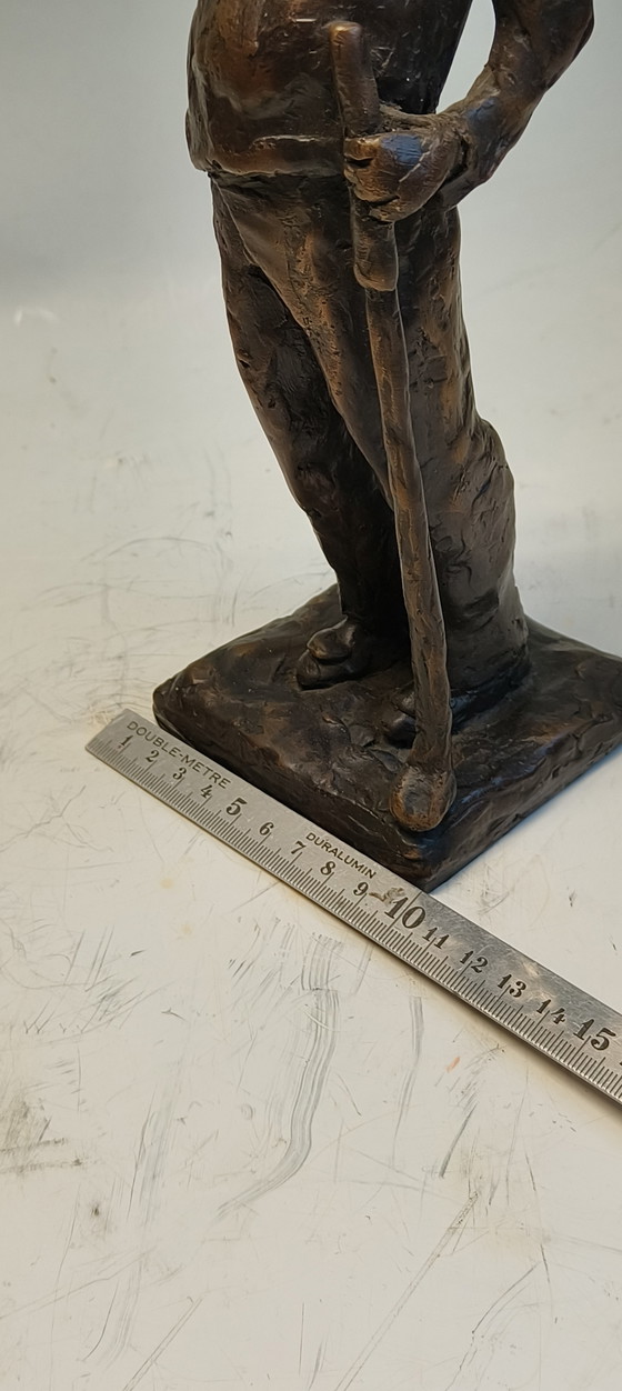 Image 1 of Image de sculpture en bronze et laiton représentant un golfeur, homme suivant