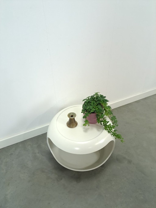 White space age coffee table on wheels