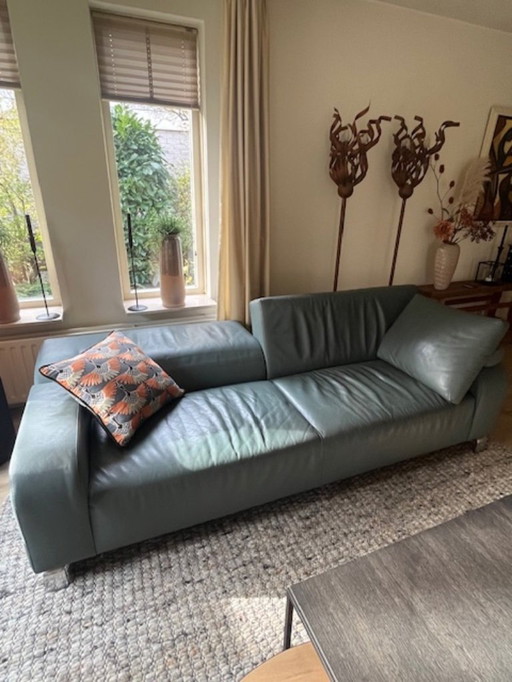 Leolux green leather sofa
