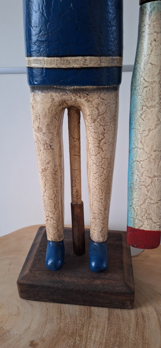 Image 1 of Antieke matroos met roeispanen als armen