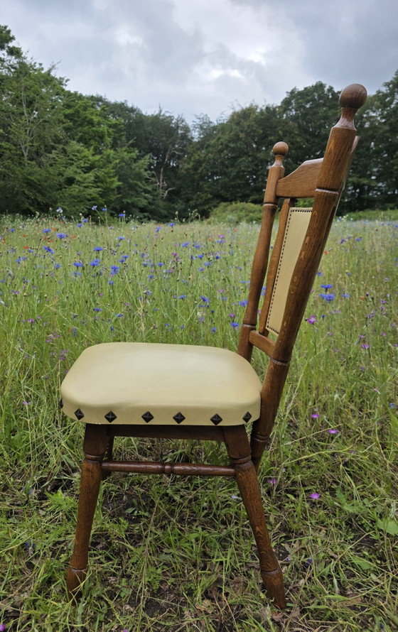 Image 1 of Set of 2 solid oak chairs with decorative nails