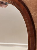 Vintage oval mirror in stained wood – 66 × 48.5 cm