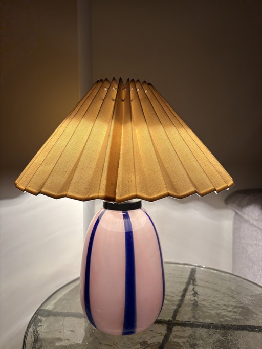 Unique table lamp with glass base