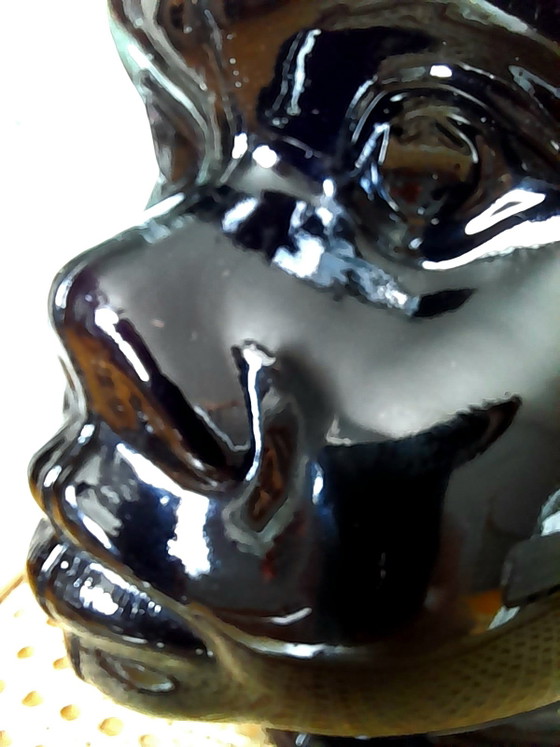 Image 1 of Jarrón o maceta con forma de cabeza de moro, de cristal, 1970.