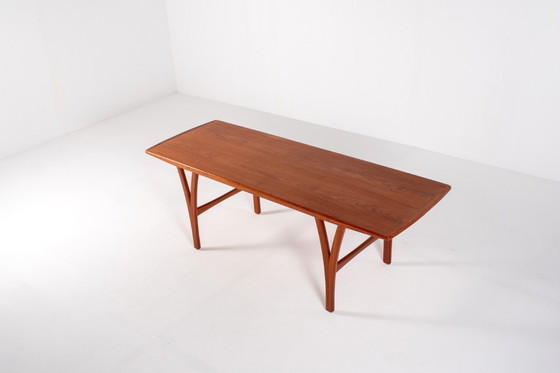 Image 1 of Grote Deense teakhouten salontafel, jaren 60