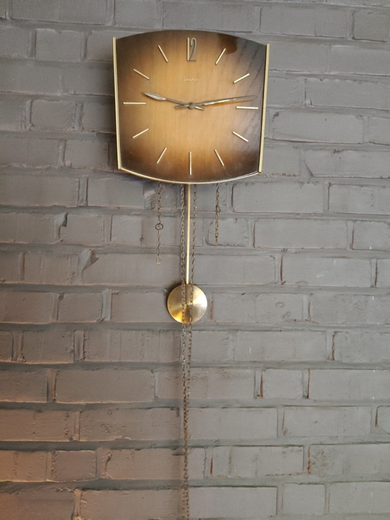 Image 1 of Vintage Junghans Mid-Century Wall Clock – German Brass Pendulum Clock