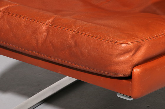 Image 1 of Cognac Leder COR Swing Lounge Stuhl mit Ottomane von Adolf & Schöpfer 1976
