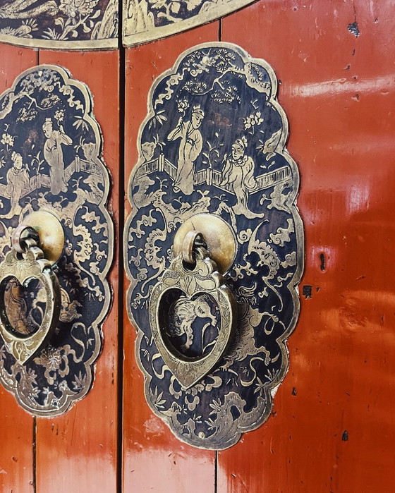 Image 1 of Antique red cabinet with brass details