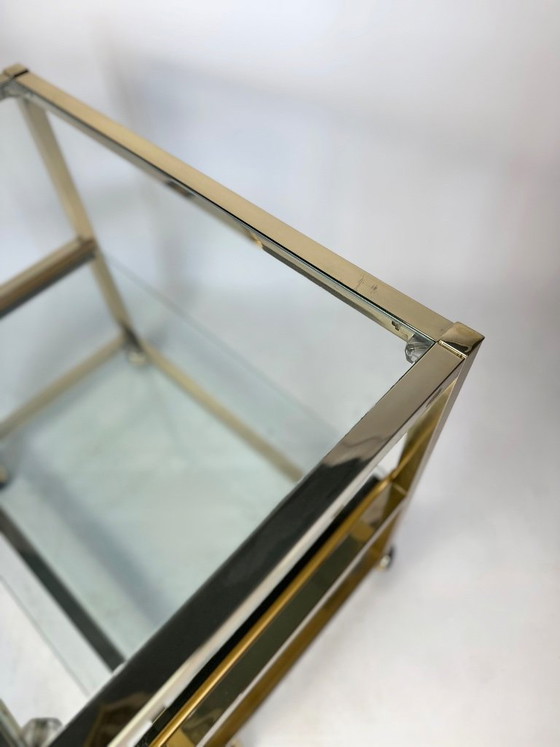 Image 1 of Vintage bijzettafel uit de jaren 80 met gouden chromen afwerking.