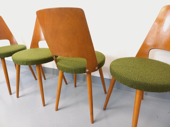 Image 1 of Set van 4 vintage Mondor stoelen van Baumann in hout en bouclé stof uit de jaren 60