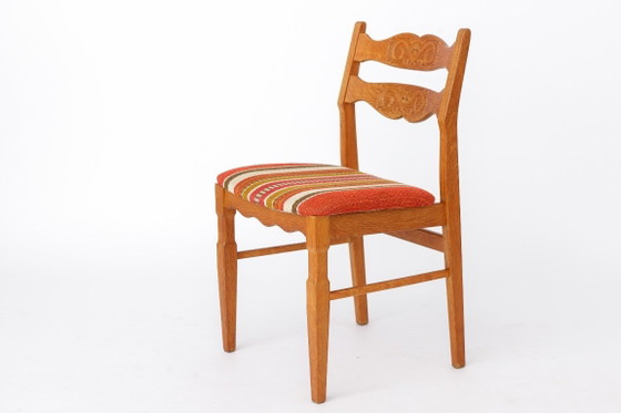 Image 1 of Ensemble de 4 chaises de salle à manger en chêne Henning Kjærnulf | Danois Moderne | EG Mobilier | années 1970