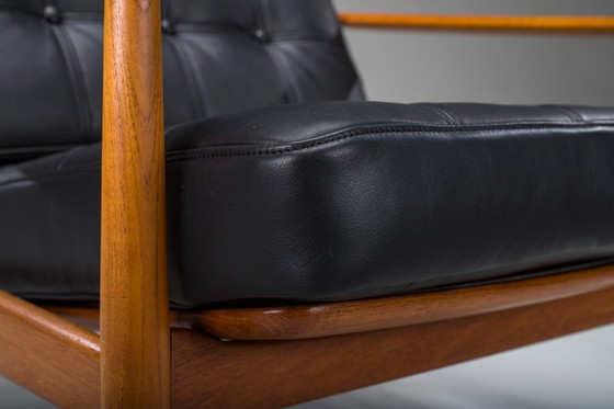 Image 1 of Fauteuil met model FD 164 frame van Arne Vodders en model 118 armleuningen van Grete Jalks in teak en zwart leer, Denemarken, ja