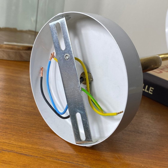 Image 1 of Large pair of brass gooseneck wall lights, clear glass globes, white metal rosettes