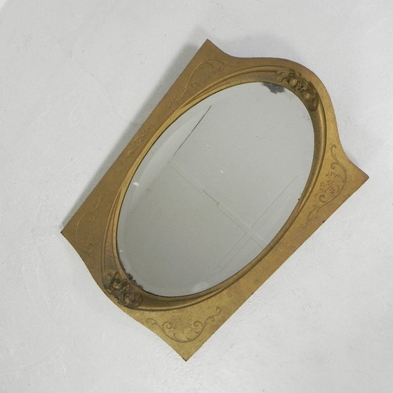 Image 1 of Gold oval mirror with cut edge, 1950s