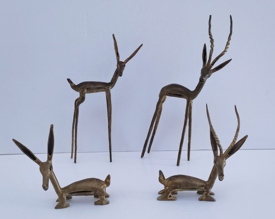 Image 1 of four gazelle antelope sculptures vintage brass