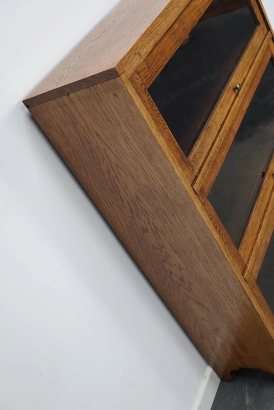 Image 1 of Duitse eiken boekenkast met schuifdeuren in de stijl van Globe Wernicke, ca. jaren 1930