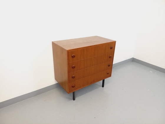 Image 1 of Vintage Scandinavische ladekast in teakhout en zwart metaal uit de jaren 60