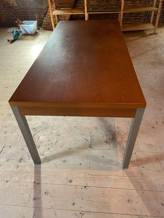 Image 1 of Simple modern, sleek oak table with stainless steel legs