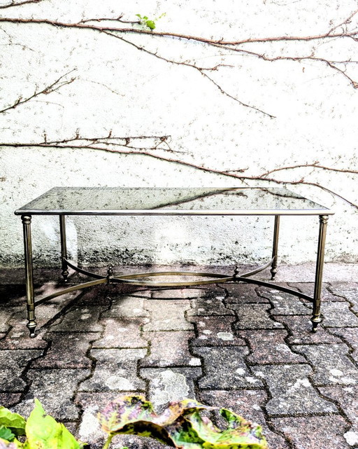 Mesa de centro de metal y cristal ahumado