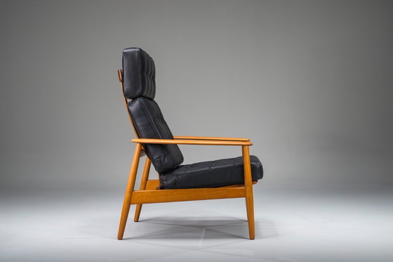 Image 1 of Fauteuil met model FD 164 frame van Arne Vodders en model 118 armleuningen van Grete Jalks in teak en zwart leer, Denemarken, ja