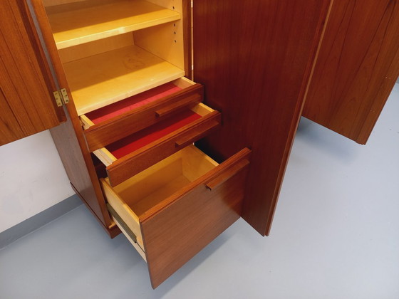 Image 1 of Tall, modernist, vintage Scandinavian sideboard in teak and black metal from the 1960s