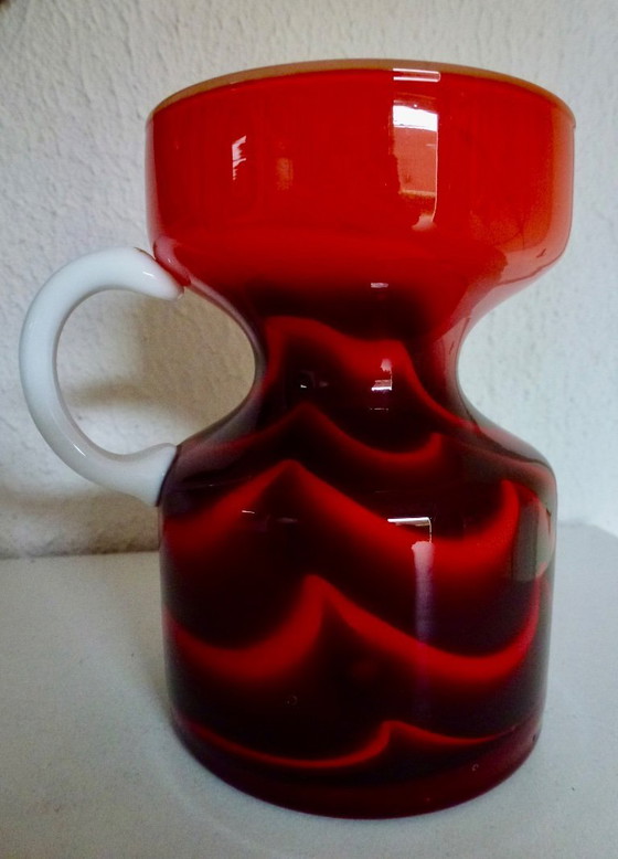 Image 1 of Vintage Murano vase in a wavy pattern with a white handle.